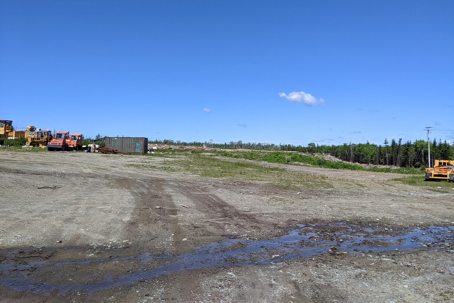 Cleared land that is currently used for equipment storage